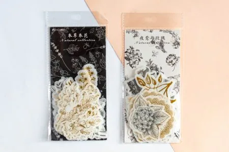 Zestaw złoto czarnych naklejek do planera lub organizera w opakowaniach